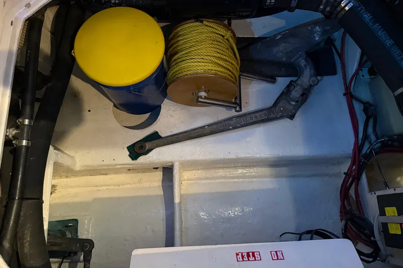 Lady Jake Yacht Photos Pics Engine compartment of 1985 Bayliner 4550 Motoryacht with tools and equipment.