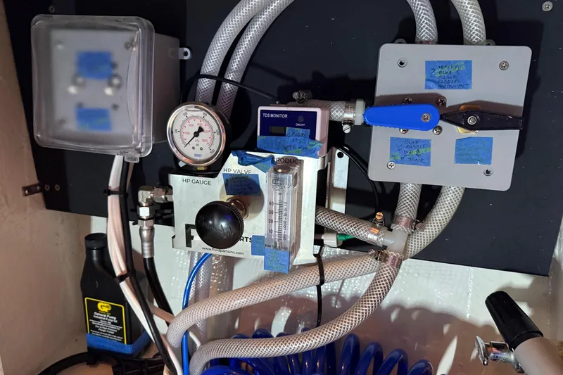 Lady Jake Yacht Photos Pics Engine room equipment of 1985 Bayliner 4550 Motoryacht, featuring gauges and valves.