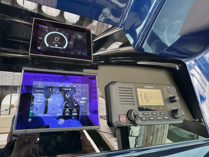  Yacht Photos Pics Dashboard of 2022 Chris-Craft CALYPSO 35 CP with navigation and communication displays.