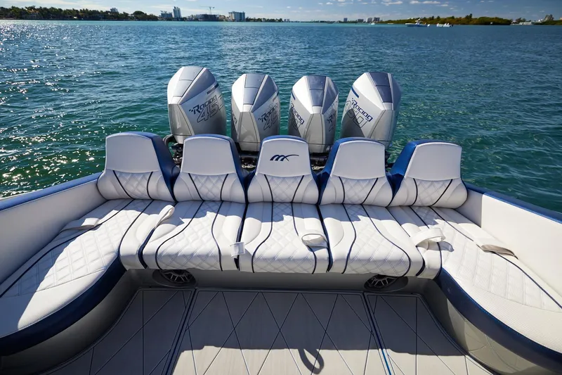  Yacht Photos Pics Luxury seating on Midnight Express 43' Solstice boat with powerful outboard engines.