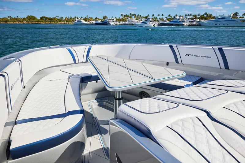  Yacht Photos Pics Luxurious seating area on a Midnight Express 43' Solstice boat, with ocean view.