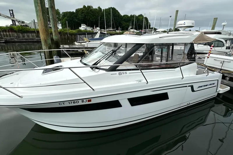 Something Special Yacht Photos Pics 2016 Jeanneau Merry Fisher 855 boat docked in a marina.