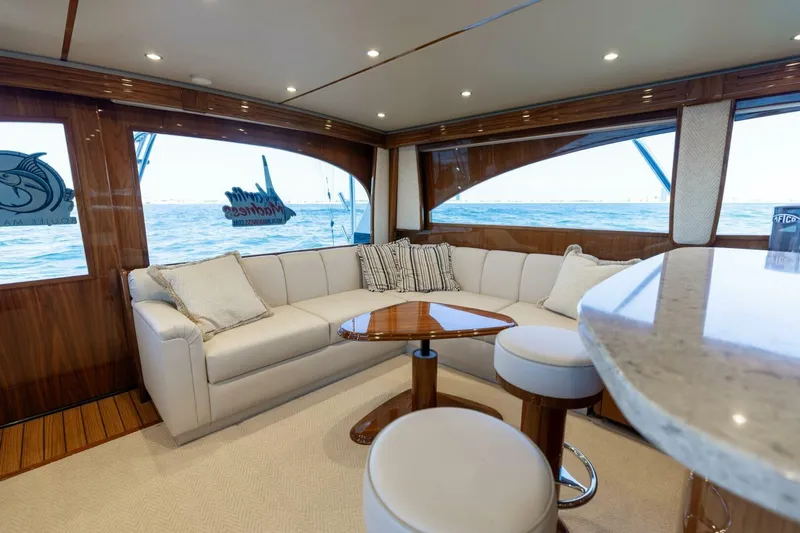 Galati Yacht Sales Trade Yacht Photos Pics Luxurious interior of 2020 Viking 62 Convertible yacht with ocean view.