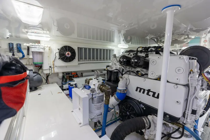 Galati Yacht Sales Trade Yacht Photos Pics Engine room of 2020 Viking 62 Convertible yacht with MTU engine components.