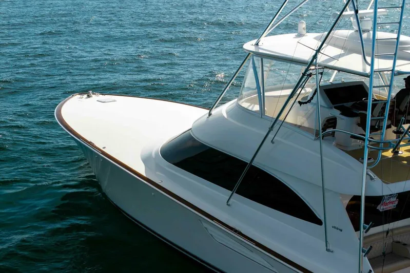 Galati Yacht Sales Trade Yacht Photos Pics 2020 Viking 62 Convertible yacht on open water, showcasing sleek design and luxury features.