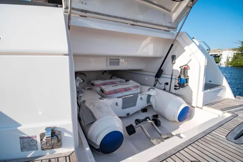  Yacht Photos Pics 2015 Riviera 5000 Sport Yacht storage compartment with equipment and accessories.