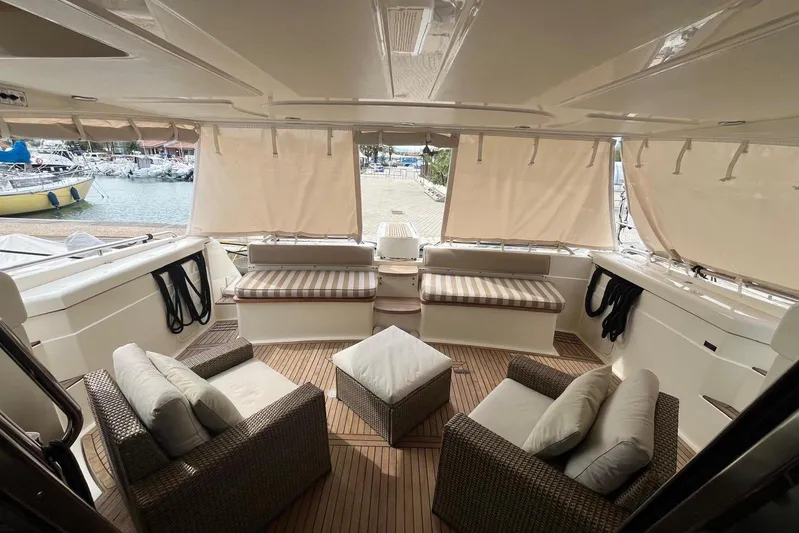  Yacht Photos Pics Luxurious 2010 Ferretti Yachts 620 interior with elegant seating and waterfront view.