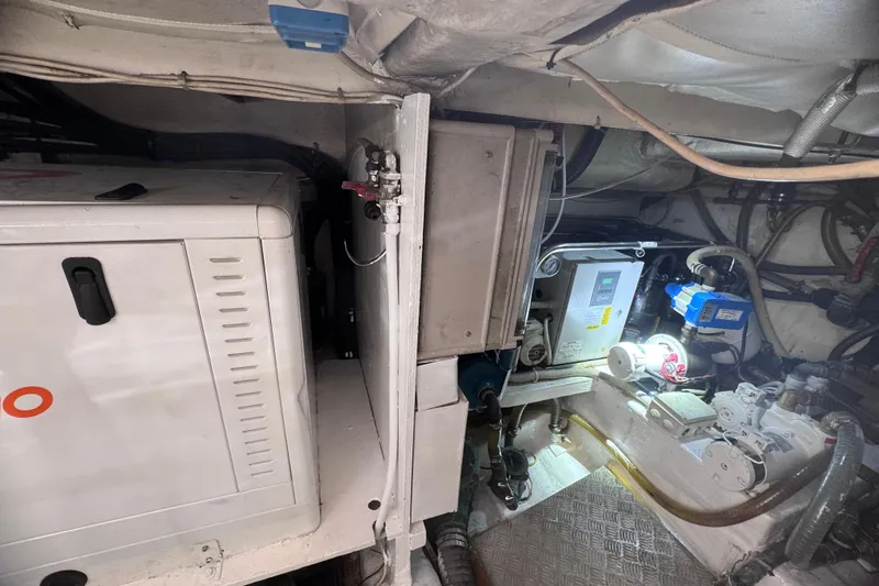  Yacht Photos Pics Engine room of a 2010 Ferretti Yachts 620, showcasing machinery and equipment.