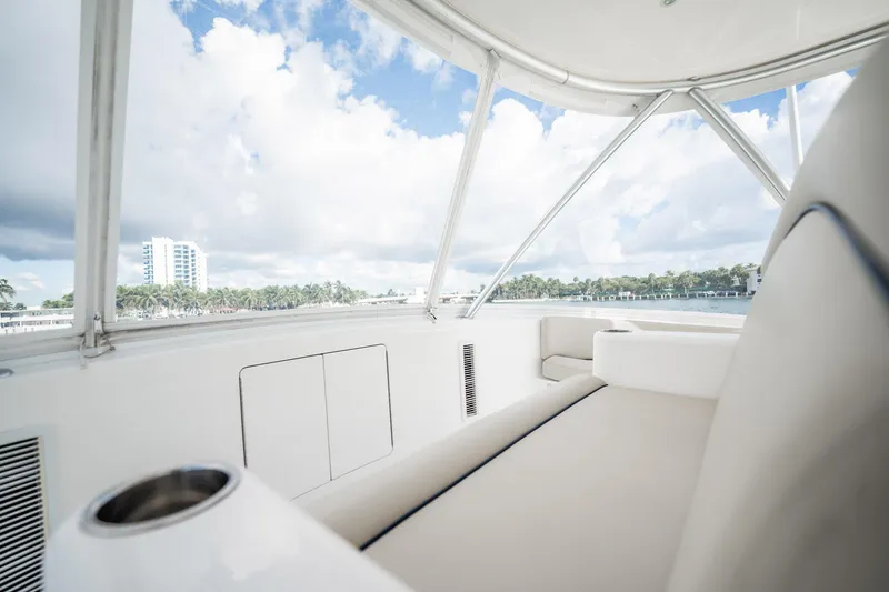 Lori A Yacht Photos Pics 2021 Viking 54 Convertible yacht interior with ocean view and modern seating.