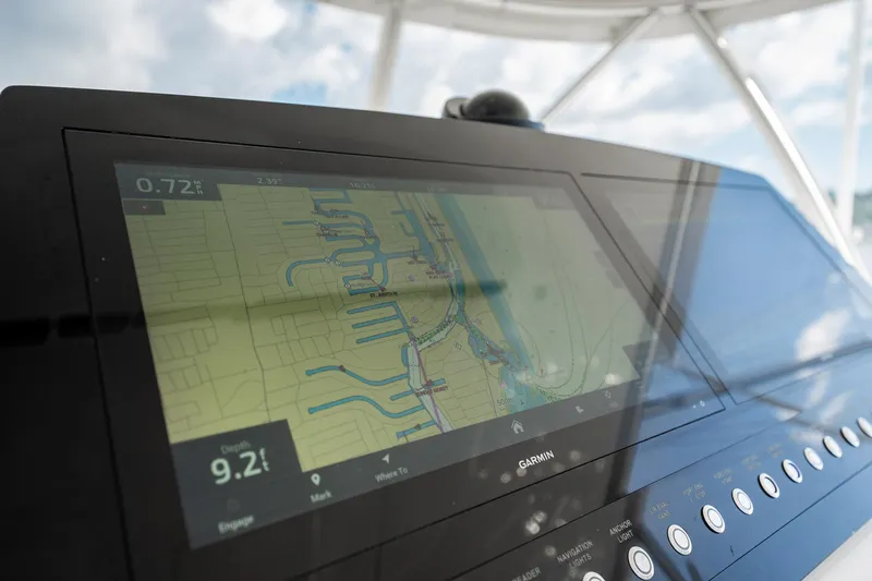 Lori A Yacht Photos Pics Navigation display on 2021 Viking 54 Convertible yacht, showing detailed marine map.