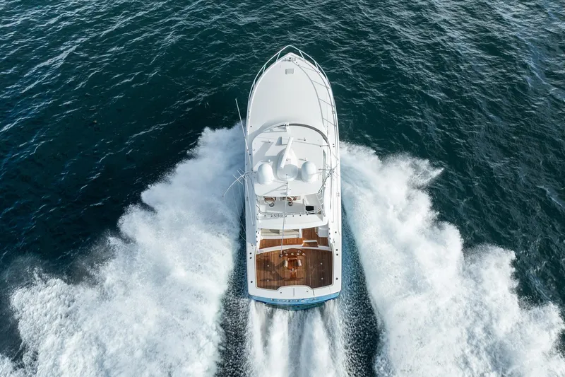 Lori A Yacht Photos Pics Aerial view of 2021 Viking 54 Convertible yacht cruising on open water.