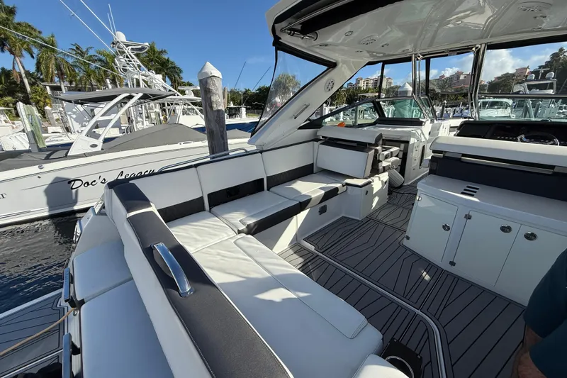  Yacht Photos Pics Luxurious interior of a 2022 Monterey 385SS Super Sport boat at a marina.