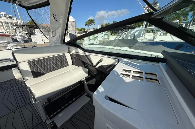  Yacht Photos Pics 2022 Monterey 385SS Super Sport boat interior with luxurious seating and modern dashboard.