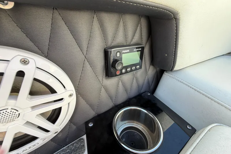  Yacht Photos Pics Interior of 2022 Monterey 385SS Super Sport with speaker, control panel, and cup holder.