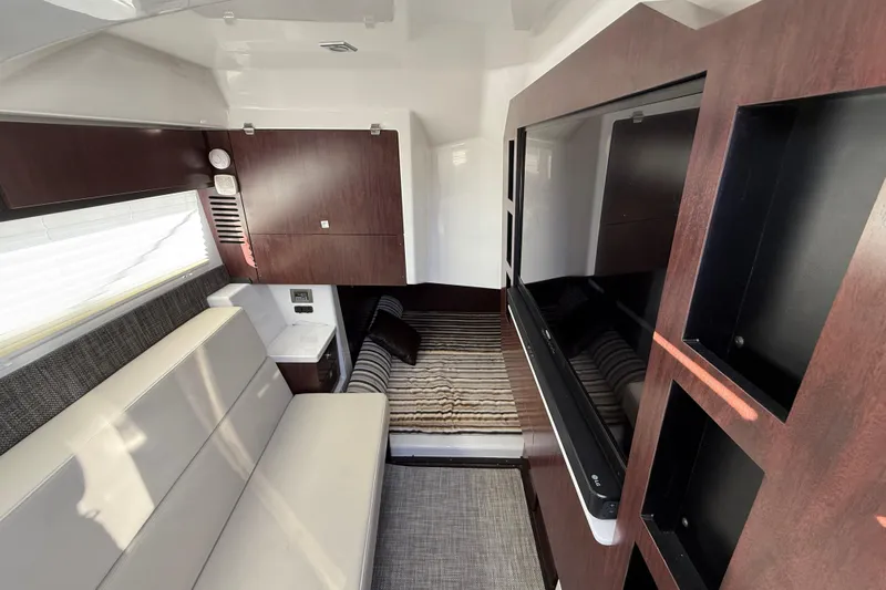  Yacht Photos Pics Interior of 2022 Monterey 385SS Super Sport boat with modern seating and wood finishes.