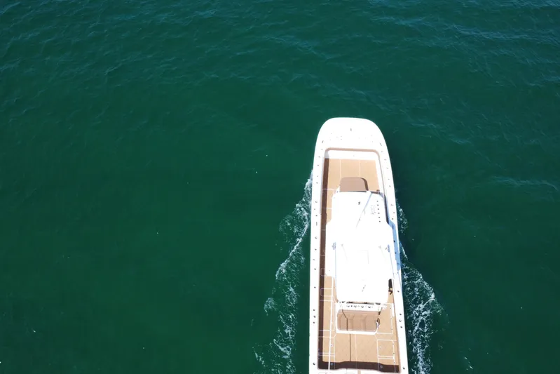  Yacht Photos Pics Aerial view of 2024 Invincible 46 Catamaran cruising on open water.