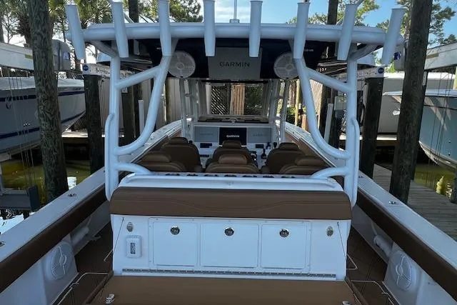  Yacht Photos Pics 2024 Invincible 46 Catamaran with Garmin electronics, docked, featuring spacious seating and storage.