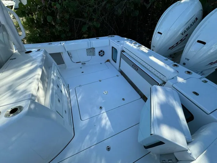  Yacht Photos Pics 2024 Sportsman 352 Open boat deck with Yamaha V8 engines, featuring spacious seating and storage.