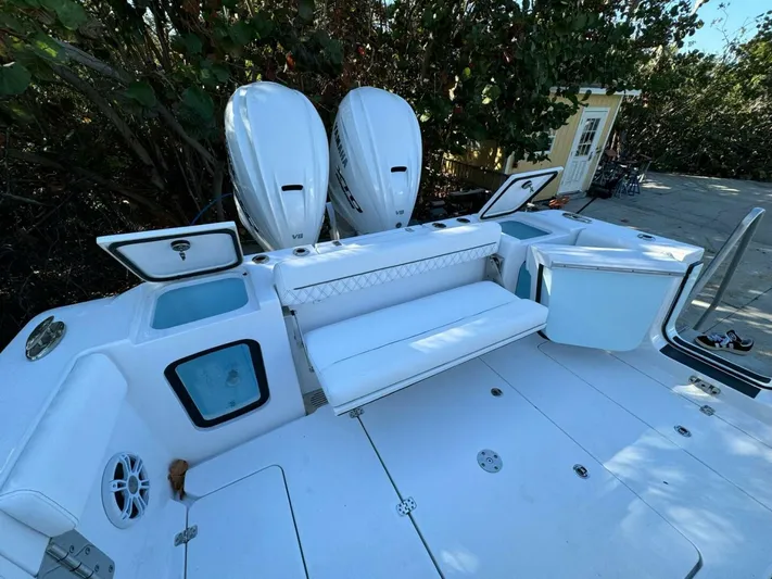  Yacht Photos Pics 2024 Sportsman 352 Open boat with dual Yamaha V8 engines, spacious deck, and seating area.