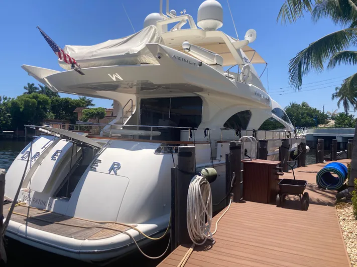 Dreamer Yacht Photos Pics Luxury 2005 Azimut 80 Carat yacht docked, featuring sleek design and spacious deck.