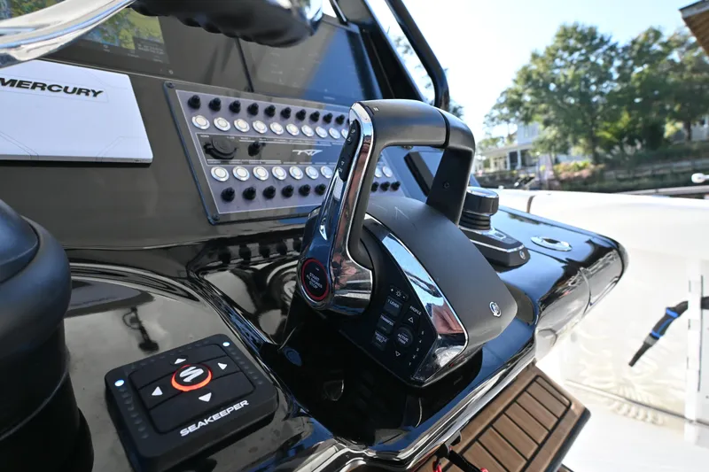  Yacht Photos Pics Close-up of 2025 Tidewater 320 CC Adventure boat controls and dashboard.