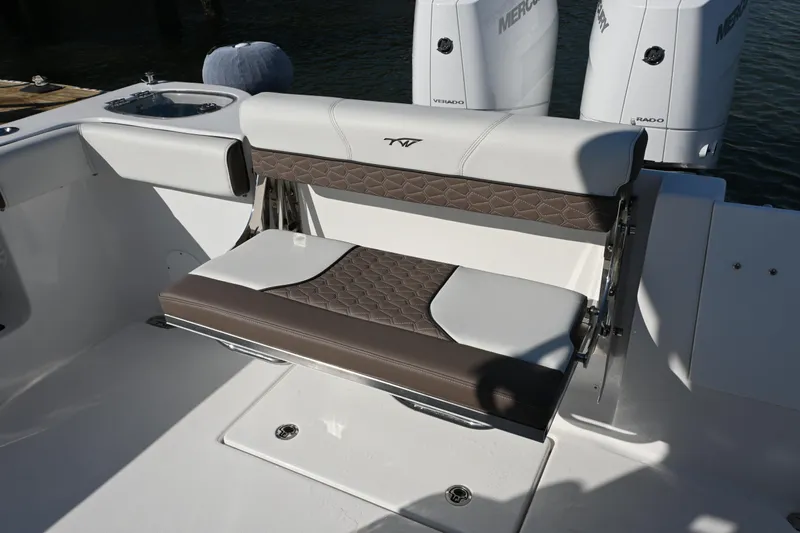  Yacht Photos Pics 2025 Tidewater 320 CC Adventure boat seating with stylish upholstery and dual Mercury engines.