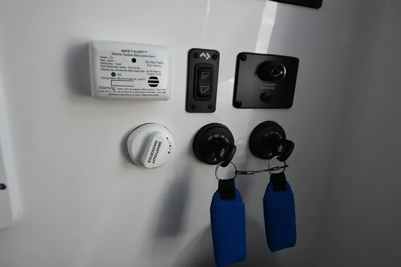  Yacht Photos Pics Control panel of 2025 Tidewater 320 CC Adventure boat with safety features and switches.