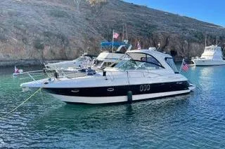  Yacht Photos Pics 2005 Cruisers 420 yacht anchored in scenic coastal waters.