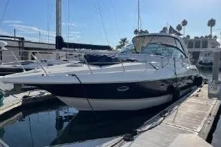  Yacht Photos Pics 2005 Cruisers 420 yacht docked at marina under clear blue sky.
