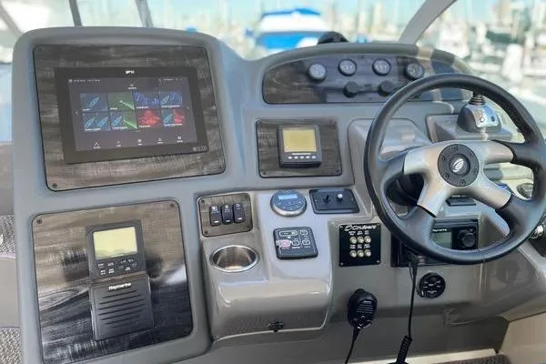  Yacht Photos Pics Helm of 2005 Cruisers 420 yacht with modern navigation and control systems.