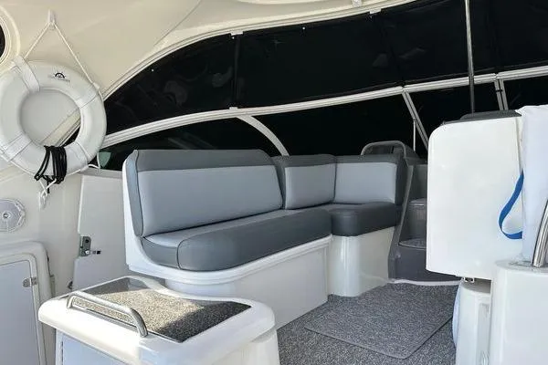  Yacht Photos Pics Interior of 2005 Cruisers 420 yacht with gray seating and life preserver.