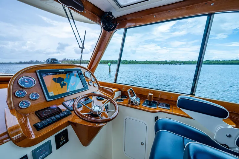 Ruckus Yacht Photos Pics 2017 Hinckley Picnic Boat 37 MKIII helm with navigation system and scenic water view.