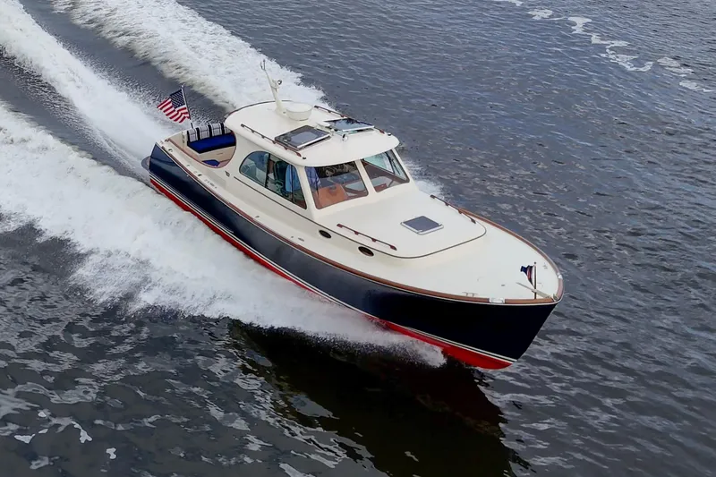 Ruckus Yacht Photos Pics 2017 Hinckley Picnic Boat 37 MKIII cruising on open water.