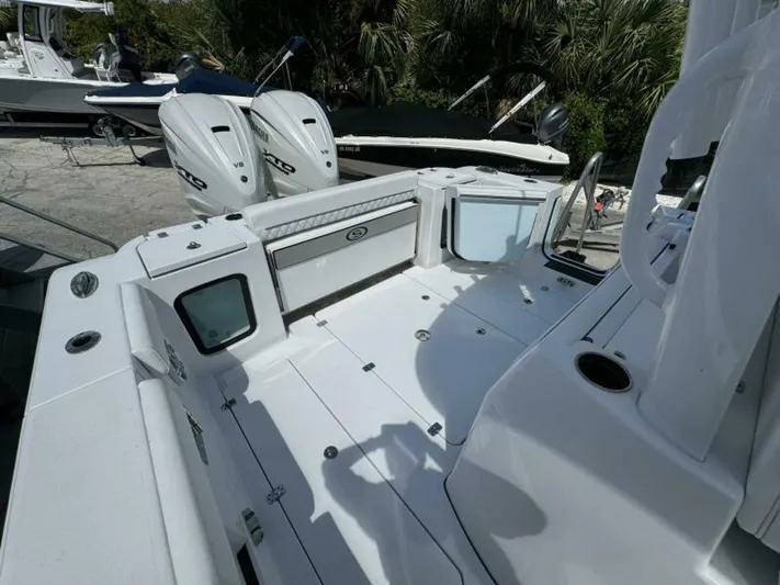  Yacht Photos Pics 2025 Sportsman 322 Open boat deck with twin Yamaha V8 engines.