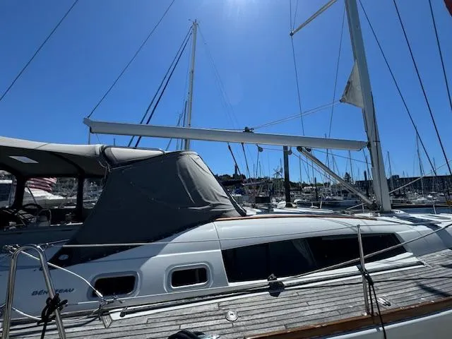 Simone Yacht Photos Pics 2007 Beneteau 490 sailboat docked under clear blue sky.