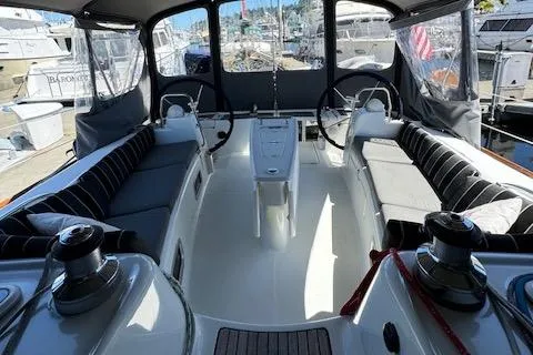 Simone Yacht Photos Pics Interior view of a 2007 Beneteau 490 sailboat cockpit with dual steering wheels.