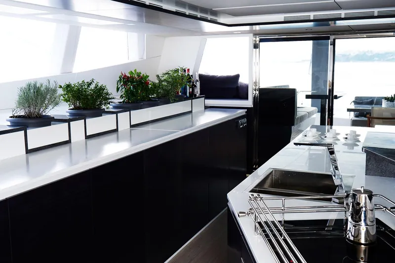  Yacht Photos Pics Luxurious Sunreef 74 yacht kitchen interior with modern design and herb garden, 2015 model.