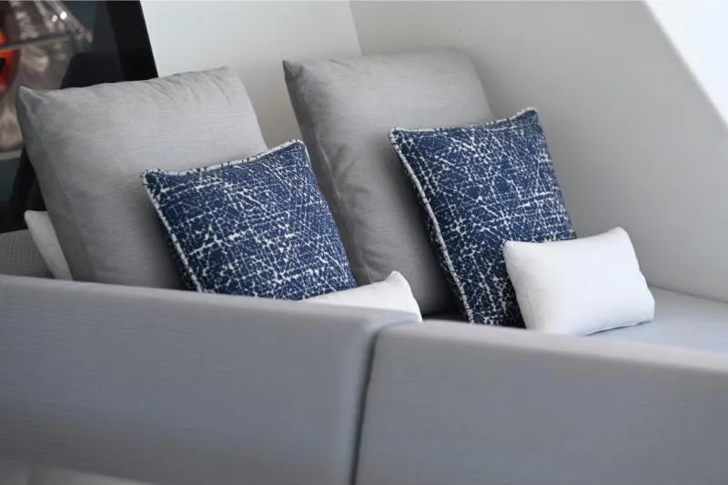  Yacht Photos Pics Luxurious Sunreef 74 yacht interior with stylish blue and gray cushions, 2015 model.