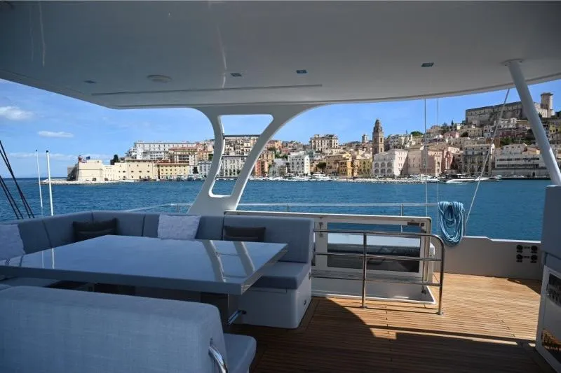  Yacht Photos Pics Luxurious Sunreef 74 yacht deck with cityscape view, 2015 model.