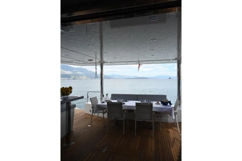  Yacht Photos Pics Luxury dining area on 2015 Sunreef 74 yacht with ocean view.