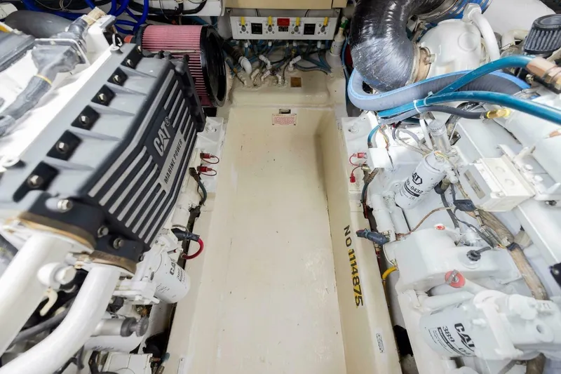 Hanalei Yacht Photos Pics Engine room of 1999 Hatteras 52 Sport Deck Motor Yacht with CAT marine power systems.