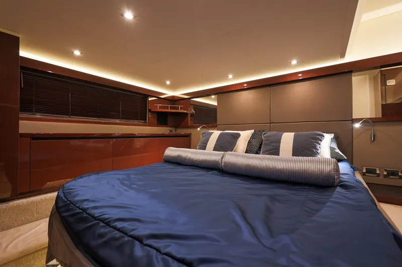 Smooth Yacht Photos Pics Luxurious bedroom interior of 2018 Sea Ray Fly 460 yacht with elegant lighting and bedding.
