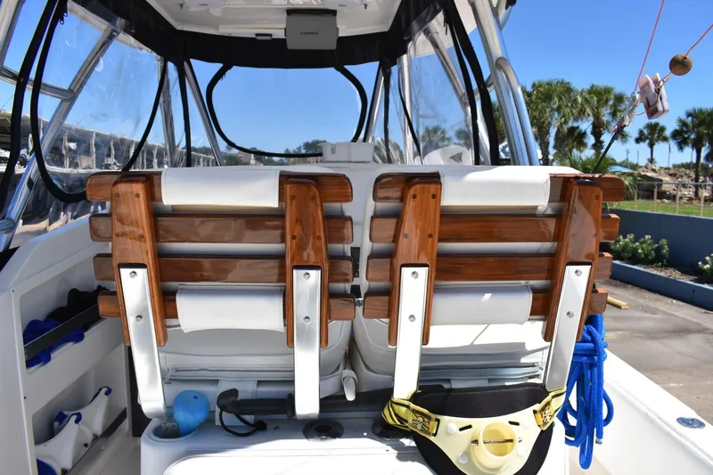 Black Friday Yacht Photos Pics 2008 Contender 36 Fish Around boat with wooden seats and fishing gear.