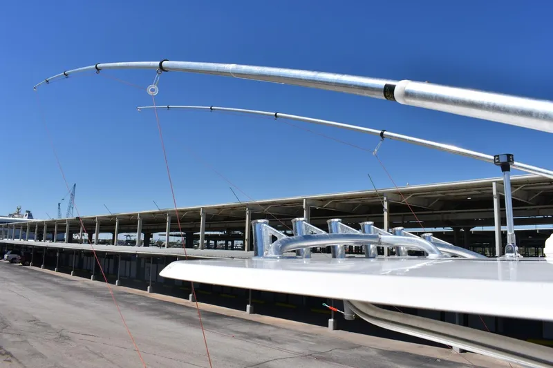Black Friday Yacht Photos Pics Fishing rods on a 2008 Contender 36 Fish Around boat at a marina.