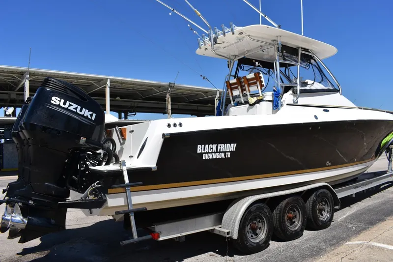 Black Friday Yacht Photos Pics 2008 Contender 36 Fish Around boat on trailer with Suzuki outboard motor.