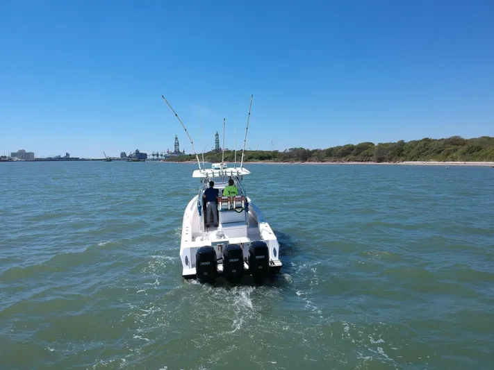 Black Friday Yacht Photos Pics 2008 Contender 36 Fish Around boat cruising on open water.