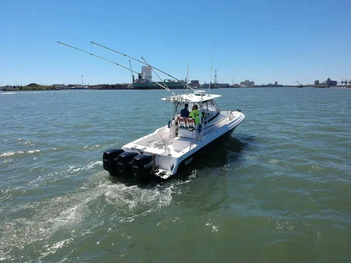 Black Friday Yacht Photos Pics 2008 Contender 36 Fish Around boat cruising on open water.