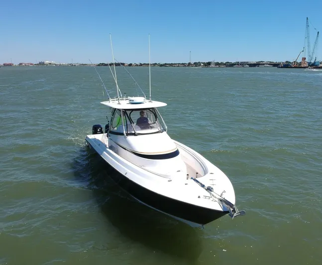 Black Friday Yacht Photos Pics 2008 Contender 36 Fish Around boat cruising on open water.
