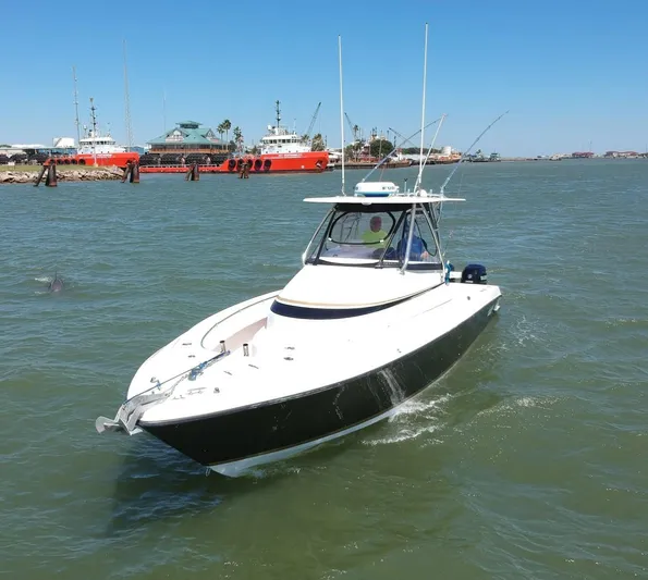 Black Friday Yacht Photos Pics 2008 Contender 36 Fish Around boat cruising in a harbor.