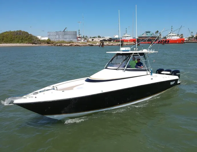 Black Friday Yacht Photos Pics 2008 Contender 36 Fish Around boat cruising in a harbor.
